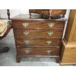 A Georgian chest of drawers (mahogany)