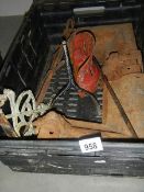 4 Victorian cast iron lion embossed corner guttering pieces, a boot scraper, a shelf bracket,