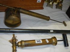 A brass Wikeham weed eradicator, a brass sprayer and one other item.