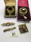 2 ornate gilt pendant/brooches set large stones, another pendant and 2 stone set brooches.