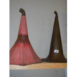 A 19th century brass gramophone horn and a painted steel gramophone horn.