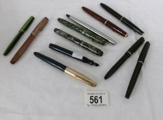A collection of vintage fountain pens etc.