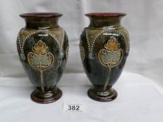 A pair of Doulton Lambeth vases, 8425B signed by Ethel Beard (and also possibly Louisa Ayling).