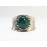 An early Georg Jensen ring set with agate cabachon, No. 124, size N half.