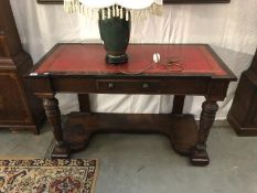 A 19th century leather topped mahogany writing table.