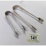 2 sets of silver sugar tongs.