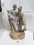 A fine 19th century continental porcelain figure group of a couple with baby. 37 cm tall.