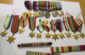 A collection of miniature medals and stars, a boxing medal, rifle medal etc.