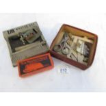 A boxed 'IM' master set gramophone needle sharpener, 2 needle cutters and an HMV speed tester.
