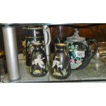 An oriental pattern teapot with pewter lids, an oriental pattern jug (chip on spout),