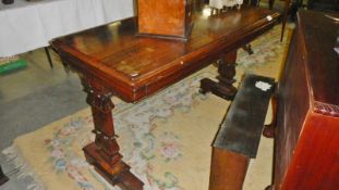 A rosewood console table