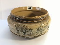 A Doulton Lambeth 1882 shallow bowl with panel of cows round it.