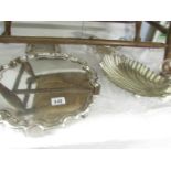 A silver plated shell dish and 3 other silver plated items.