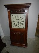 An oak 'Old Charm' battery operated wall clock with key box interior.