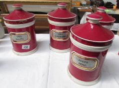 4 early 19th century large pink chemist jars (a/f).