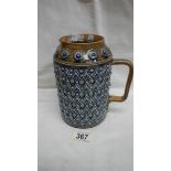 A Doulton Lambeth 1877 jug by Harriet E Hibut.