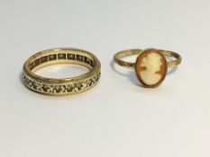 A 9ct gold and diamond eternity ring, size O and a 9ct gold shell cameo ring, size N.