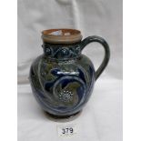 A Doulton Lambeth jug, 1875, well decorated both in smooth,