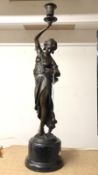 A French bronze figure of a lady, signed.