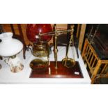 A set of Victorian Avery shop scales on a timber base.