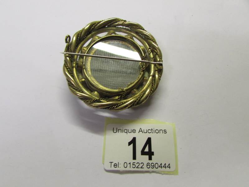 A Victorian yellow metal memorial brooch with safety chain. - Image 2 of 2