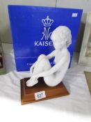 A boxed Kaiser nude figure, Megan, on stand.