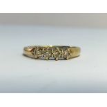 A yellow gold 4 stone diamond ring, size J.