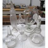 3 glass apothercary bottles (one missing lid) and 2 glass apothecary lids.