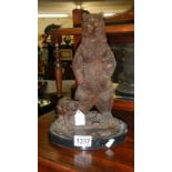 A bronze bear with cub