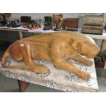 A one piece carved wood jaguar signed Marcio Anezio (Brazilian artist).