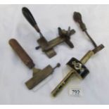 A Blanchard Paris leather plough, a carpenters scribe and 2 other items.