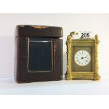 A Hunt and Roskell brass repeater carriage clock in original case.