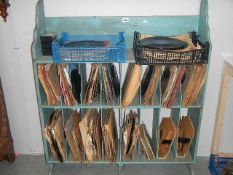 A large collection of 78 rpm records on record storage shelves.