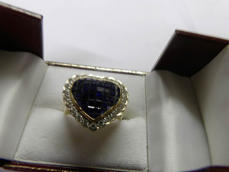 An 18ct gold sapphire and diamond heart shaped ring, size U. - Image 7 of 7