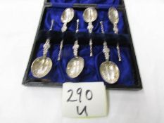 A cased set of 6 silver spoons.