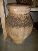 A large Grecian style garden pot.