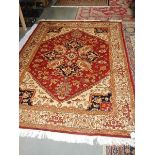 A red ground heriz rug, 230 x 160 cm.