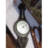 An oak barometer (glass a/f).