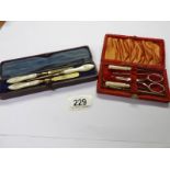 A manicure set marked 'Aspray, London' and one other.