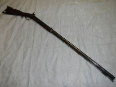A 19th century American Plains Kentucky long rifle.
