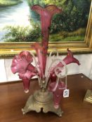 A mis-matched Victorian cranberry glass epergne on metal base.
