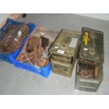 2 ammunition tins, a quantity of cast iron shoe lasts, tools etc.