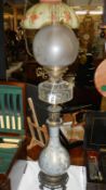 A tall French decorative oil lamp, circa 1915.