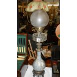 A tall French decorative oil lamp, circa 1915.