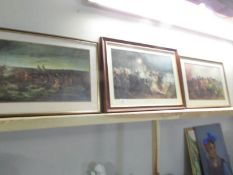 3 framed and glazed military prints.