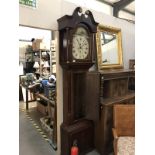 An arched dial 8 day Grandfather clock, R. Dunne Bradford.