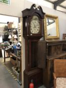 An arched dial 8 day Grandfather clock, R. Dunne Bradford.