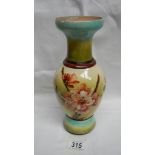 A Doulton Faience vase depicting flowers by Minna Crawley (1878-85) assisted by Alice Campbell with