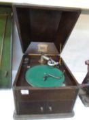 An oak cased "His Master's Voice" gramophone.