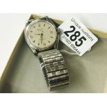 A 1959 Rolex wrist watch with 3,6,9 face. (Not original strap and minor scratches to glass).